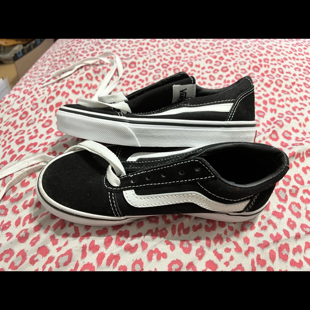 Black and white brand new unworn vans ( do not have the box)